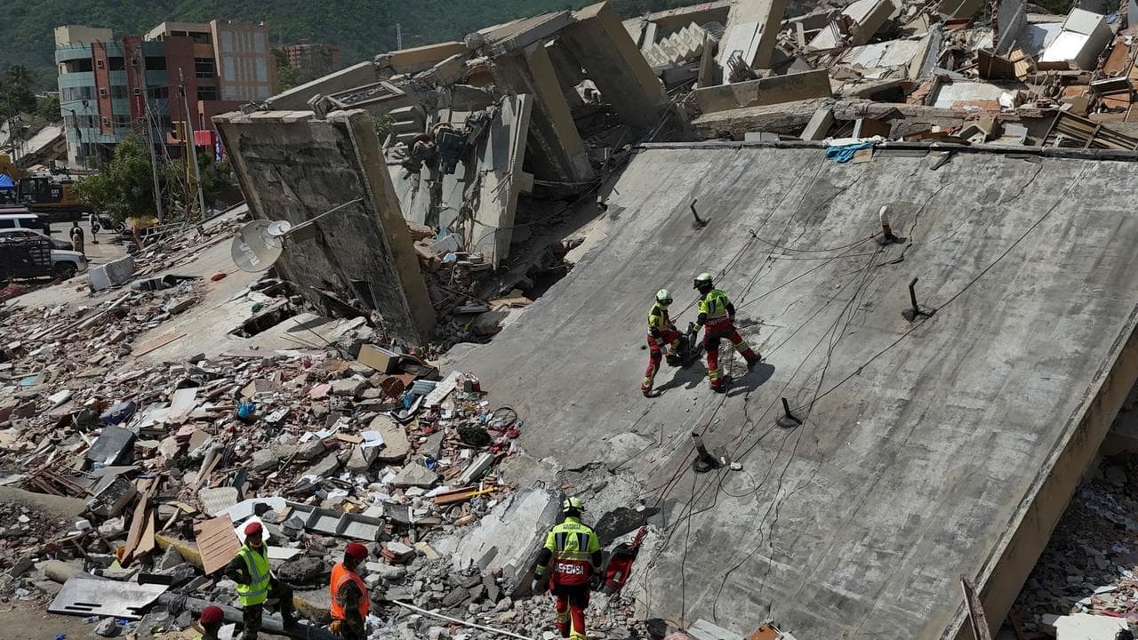 Aftershock rattles Venezuela as rescuers search rubble
