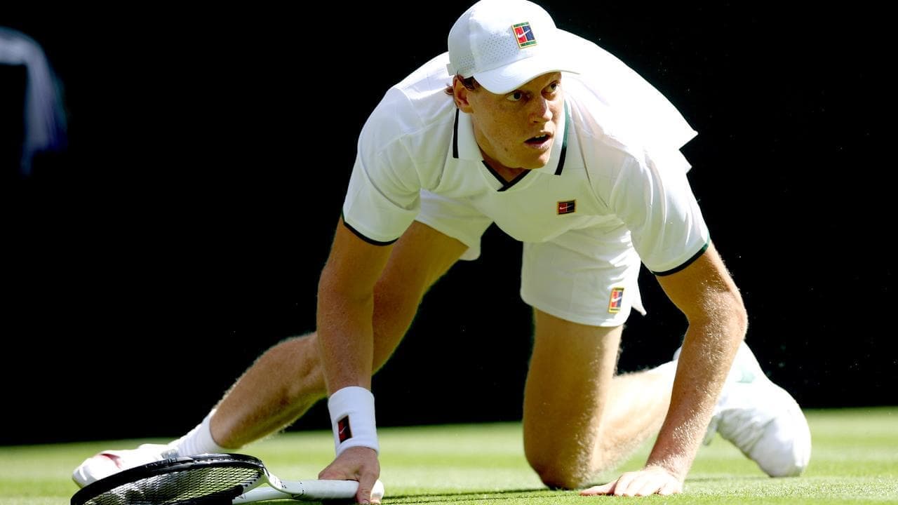 Shaken defending champion survives Serbian scare