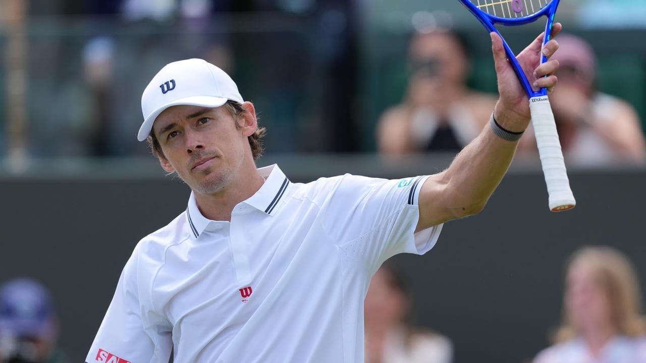 De Minaur casts off nerves to advance at Wimbledon