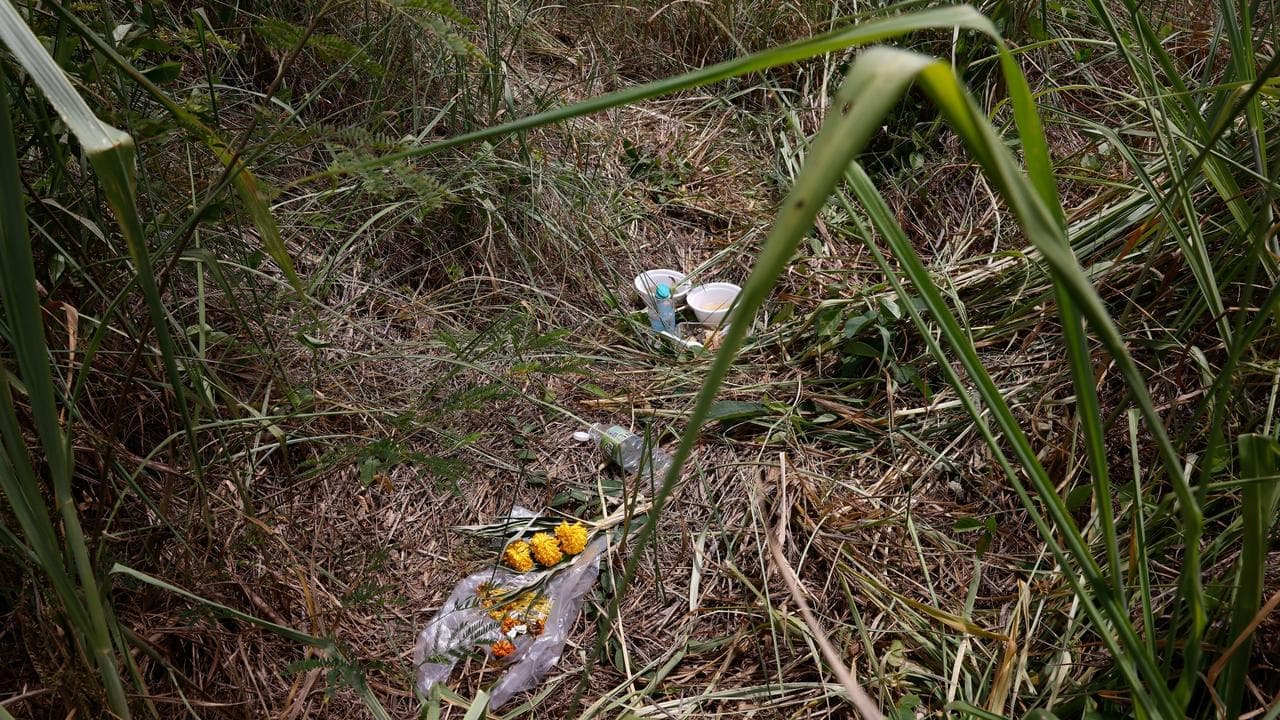 Photos reveal grim details of alleged suitcase murder