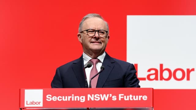 Right-wing rivals locked in 'race to the bottom': PM