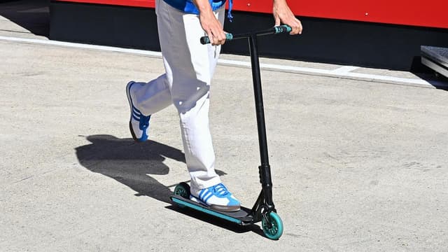 Axe-wielding attacker allegedly murdered with scooter