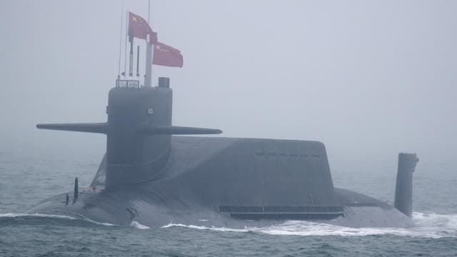 China test fires missile in Pacific as alliance struck