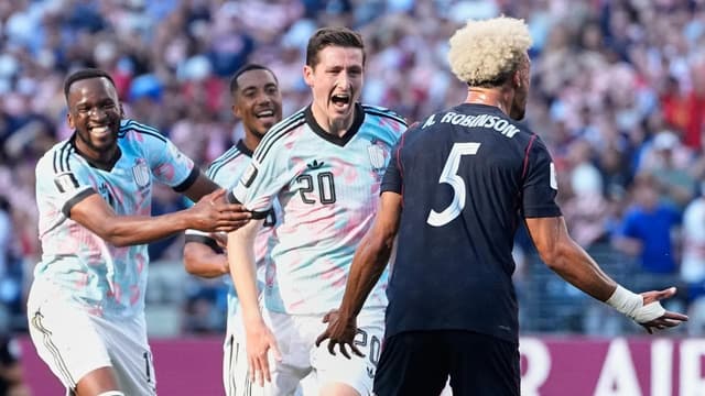 Belgium into QFs after beating last remaining co-hosts