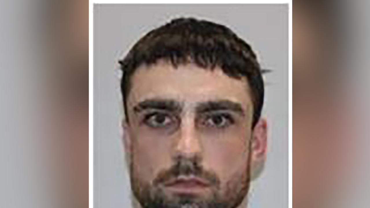Suspected bikie captured days after escaping custody