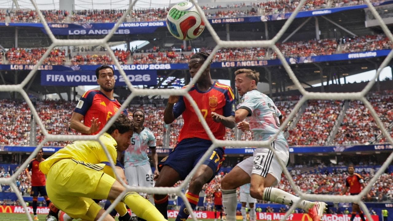 Super-sub Merino punishes error as Spain go through