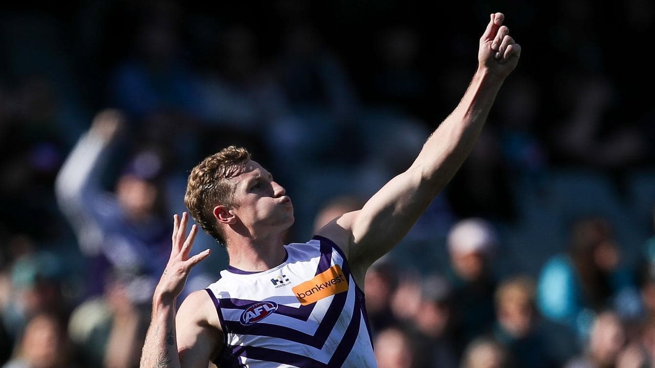 Flag fancies Fremantle overpower plucky Port Adelaide