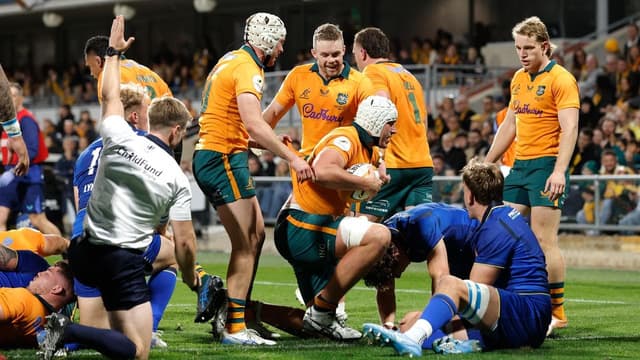 Lock it in as hat-trick helps Wallabies wallop Italy