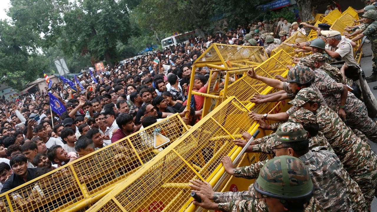 Police in India clash with Cockroach party supporters