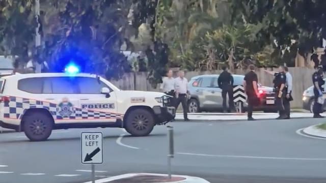 Man charged, cops probed after bystander shot in arrest