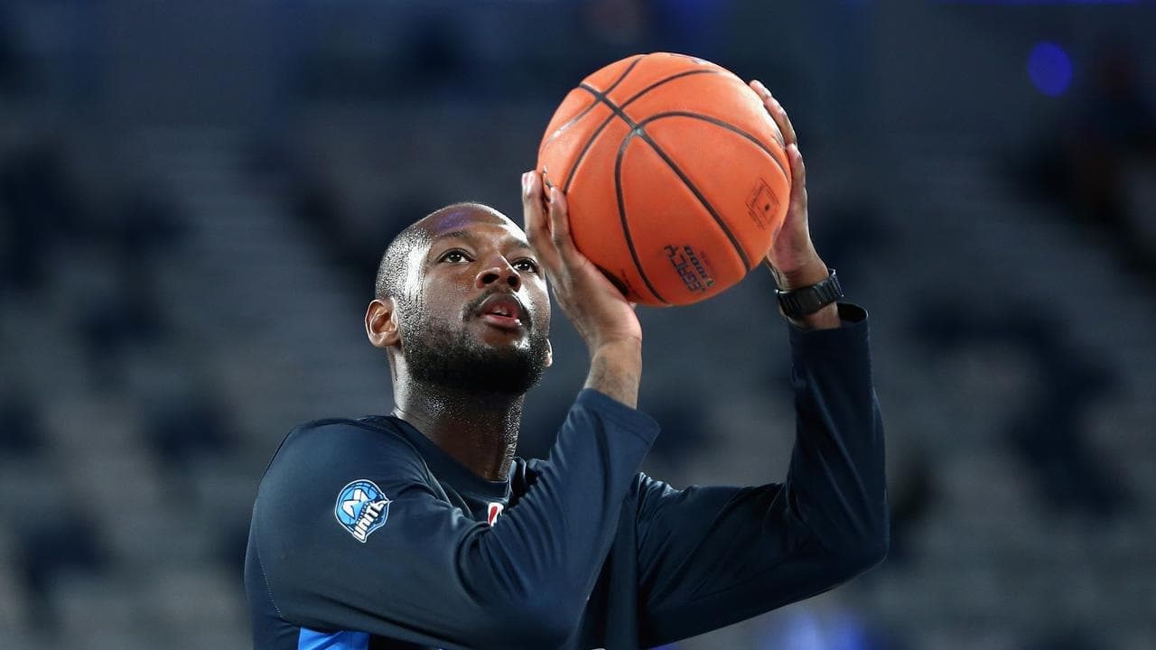 NBL's Illawarra Hawks sign championship guard