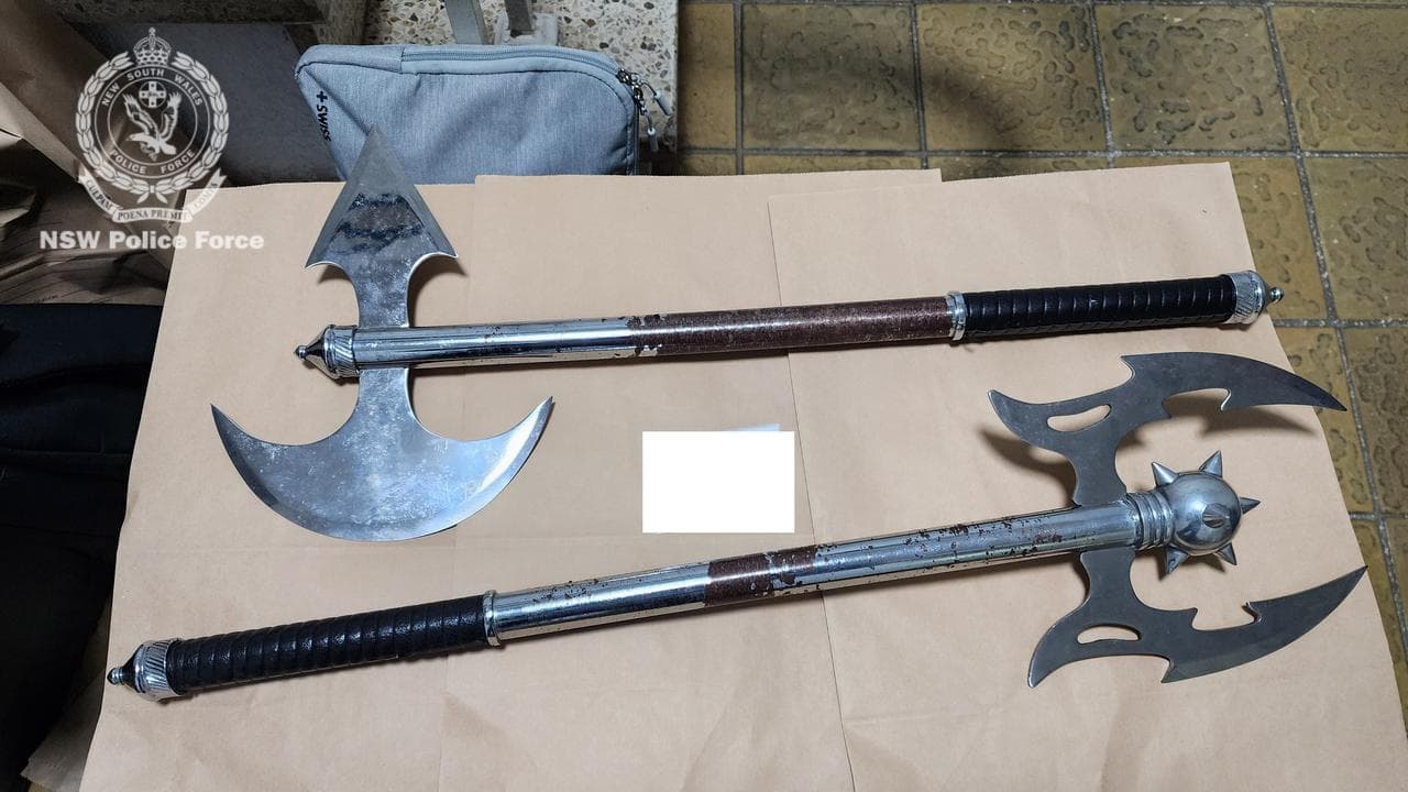 Suburban raids net crossbows, guns and battle axes