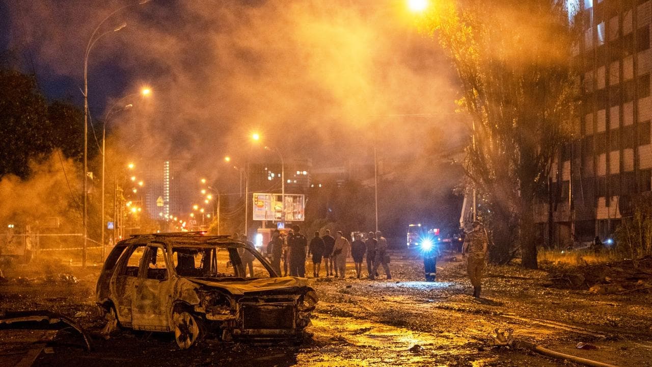 Russia pounds Kyiv with missiles, killing at least nine