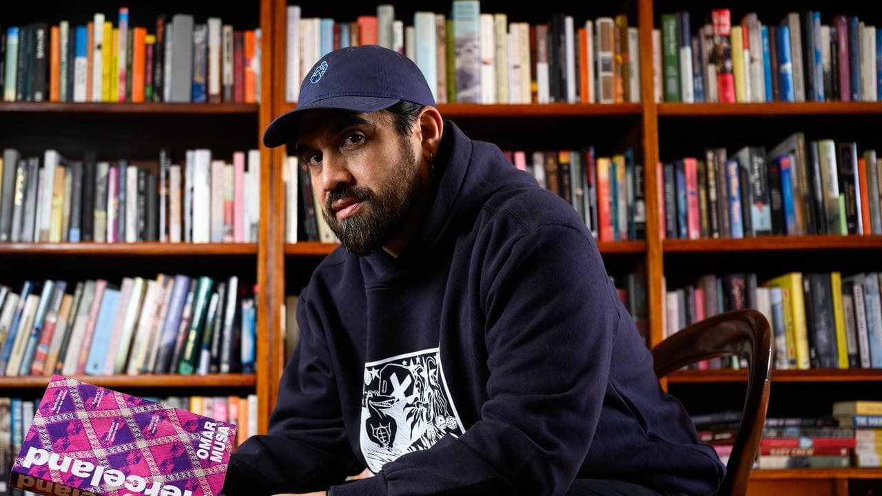 Six years, 21 drafts earn hip-hop poet top book prize