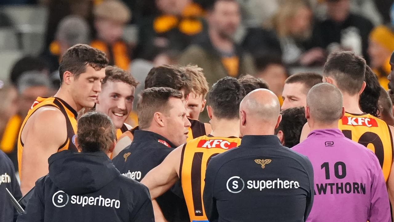 Hawks coach becomes 'glorified fan' in landmark finish