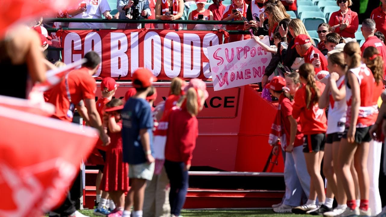 Swans fans support club in tense return to the field