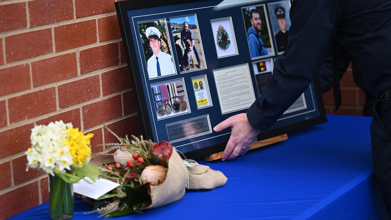 Dreams cut short: slain officers mourned on anniversary