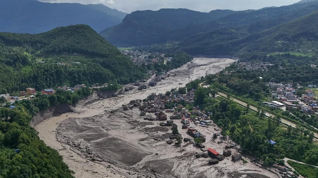 Dozens of Australians missing in deadly flash floods
