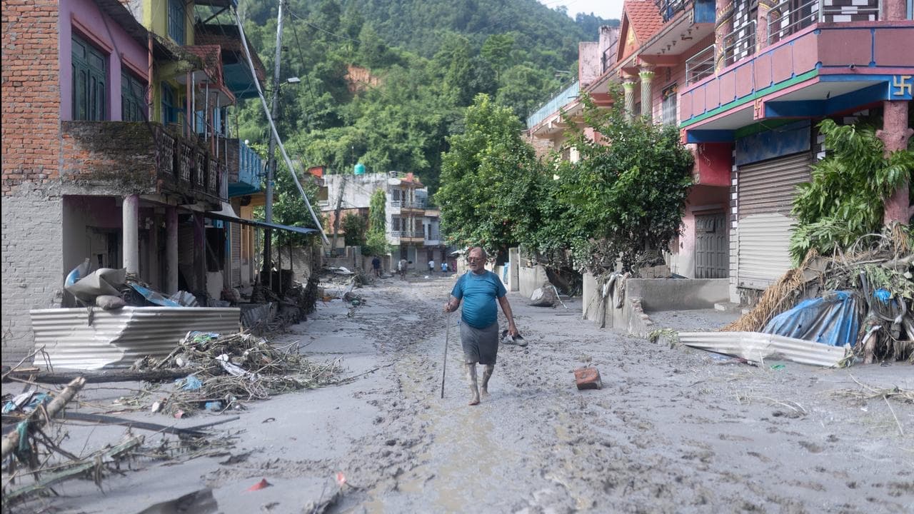 Missing Aussie makes contact as flood disaster worsens