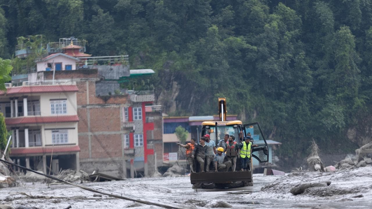 Aussie families cling to hope in Nepal flood search