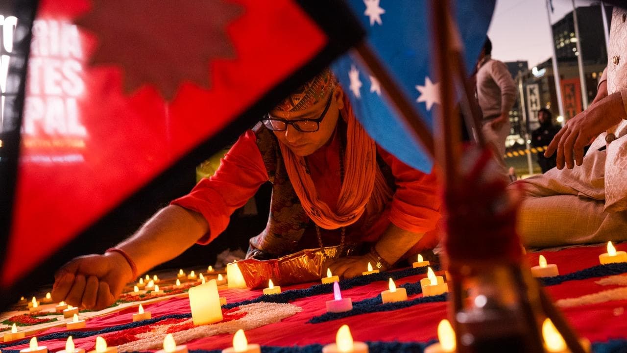 Desperate wait continues as hundreds attend Nepal vigil
