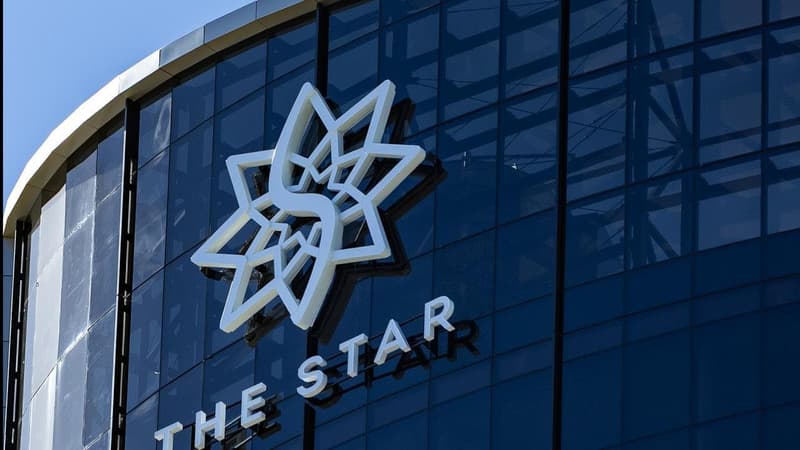 Chips still down at casino group as loss narrows