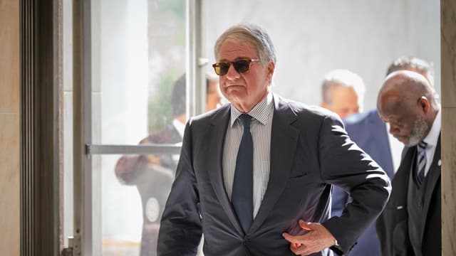 Black skips Epstein deposition, sues US House committee