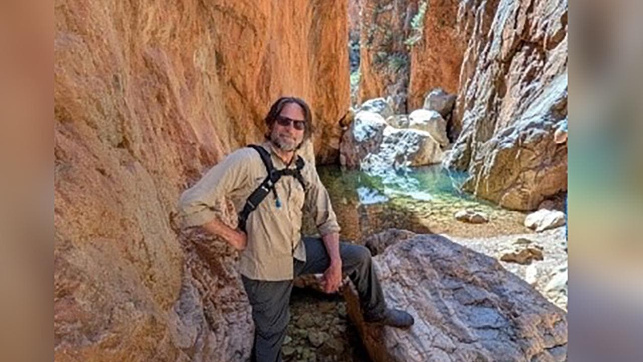 Divers find body of man in waterfall plunge pool