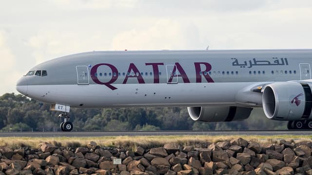 Two men detained after altercation on flight to Doha