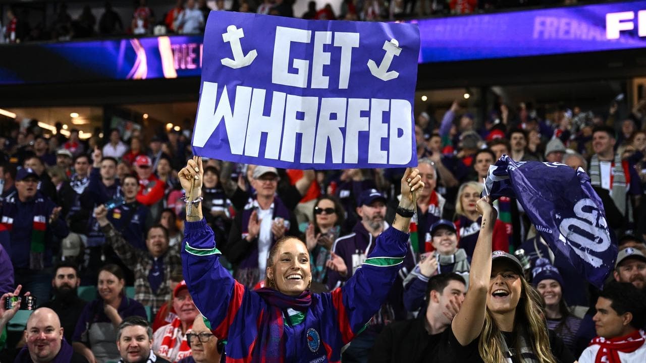 Wharfies make way to the MCG, whatever the price