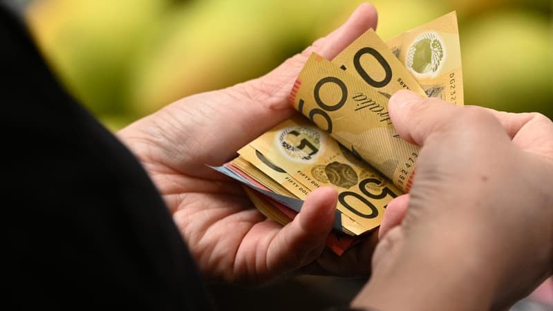 Bribery accused denies link to wife's death overseas