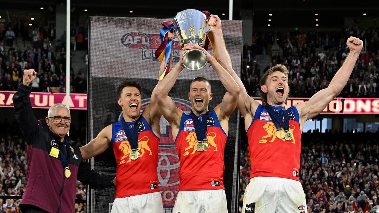 Third time's the charm as Lions leap into AFL history