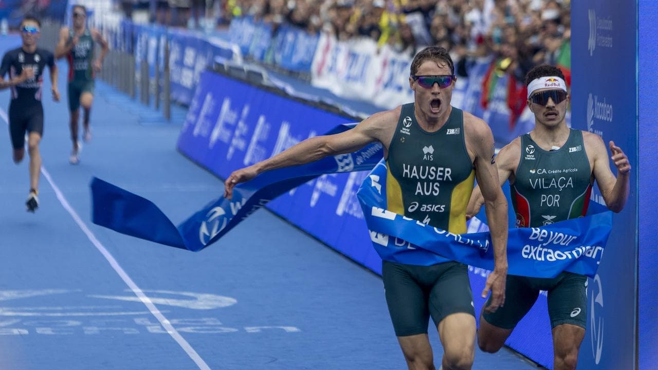Aussie Hauser triumphs but loses world triathlon crown