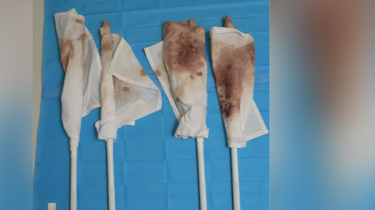 Shoe print and AFL kit show cop's graphic kill clean-up