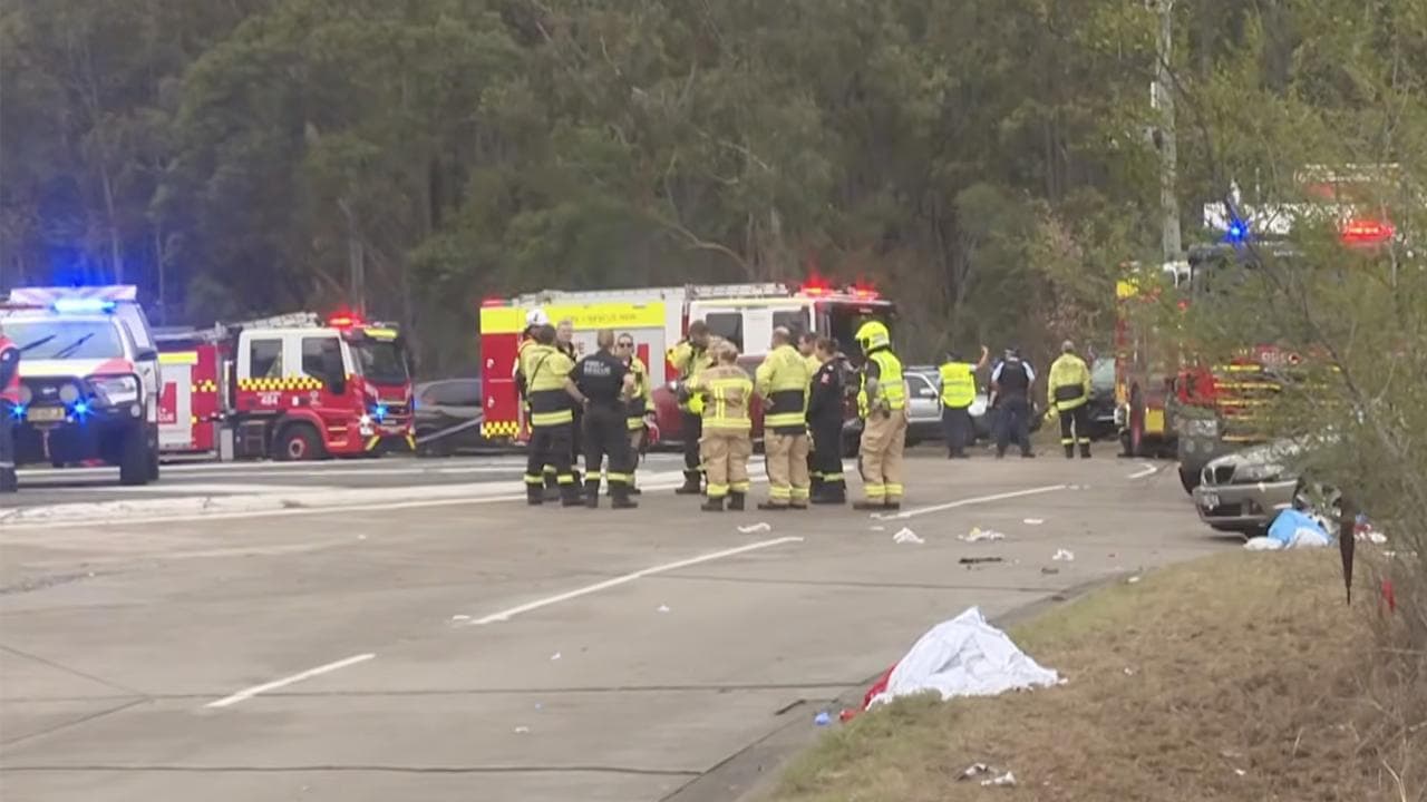 Ten injured as car crashes into grand final footy fans