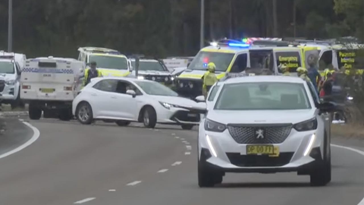 Girl fights for life after car hits group of NRL fans