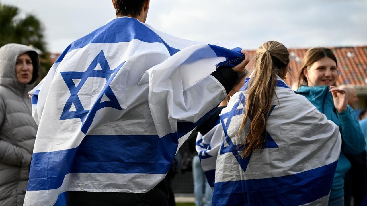 Sombre vigils mark October 7 attack amid heavy security