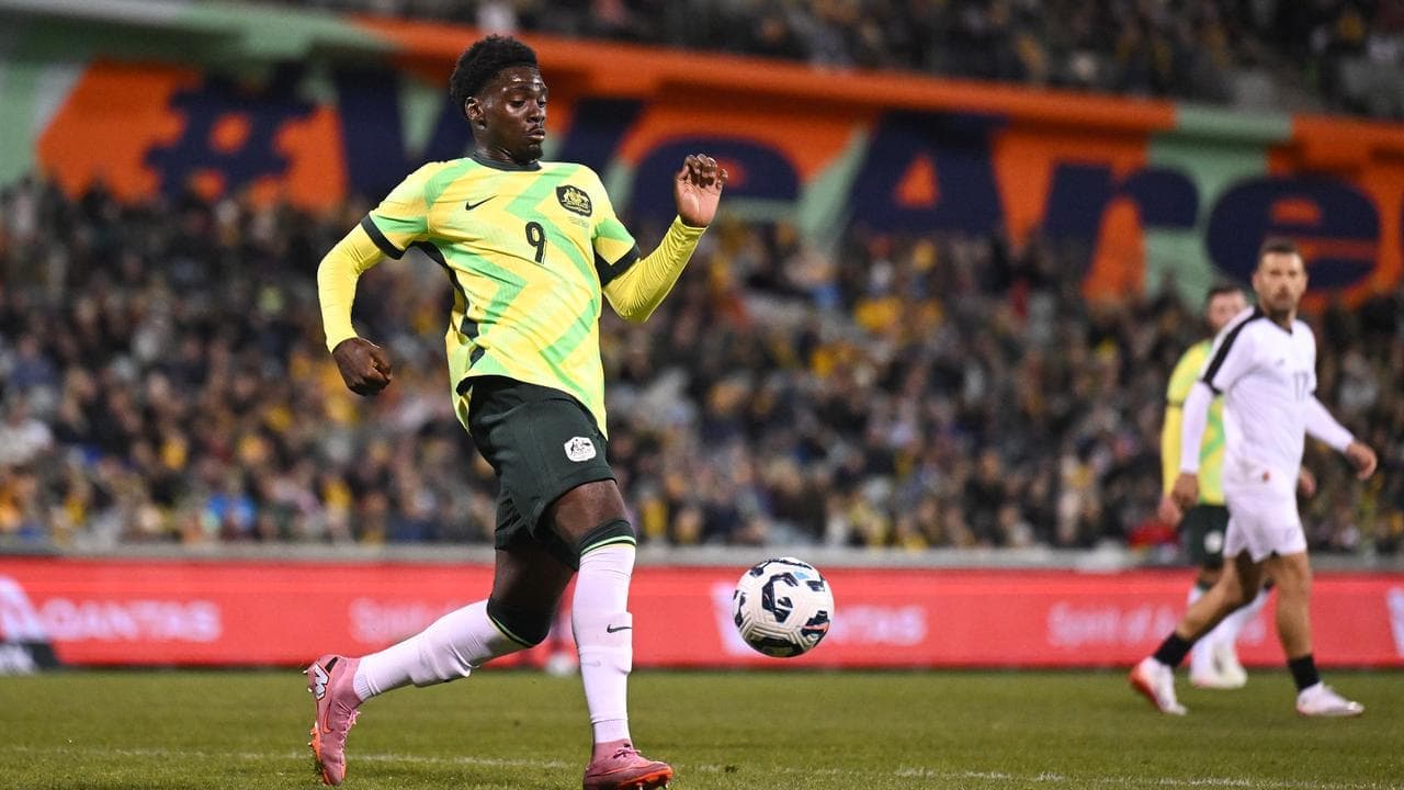 Injured Socceroo in a race to be fit for Asian Cup