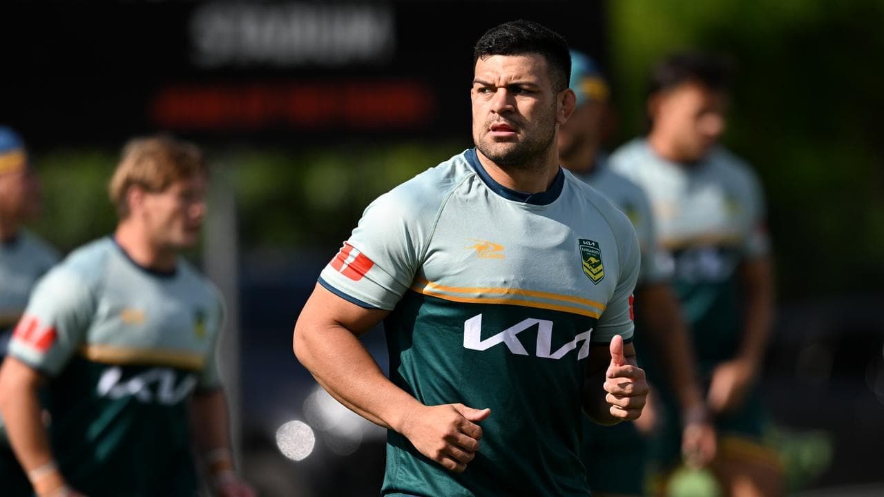 Rabbitoh beats 'hard times' to make Australia debut