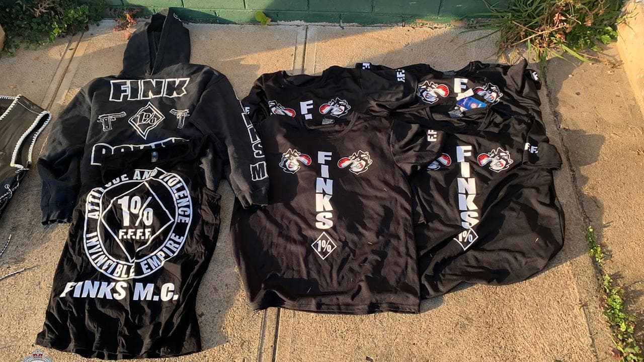 Two alleged Finks bikie members charged after raids