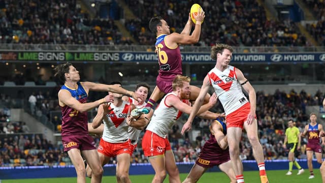 Brisbane Lions shrug off gallant Swans at Gabba