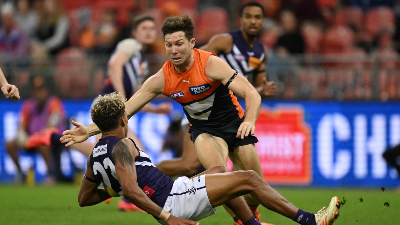 Greene stars, Giants stun Dockers in AFL thumping