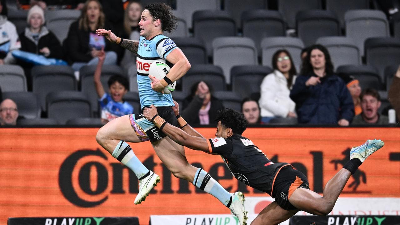 Sharks race away from spirited Tigers for 36-12 NRL win