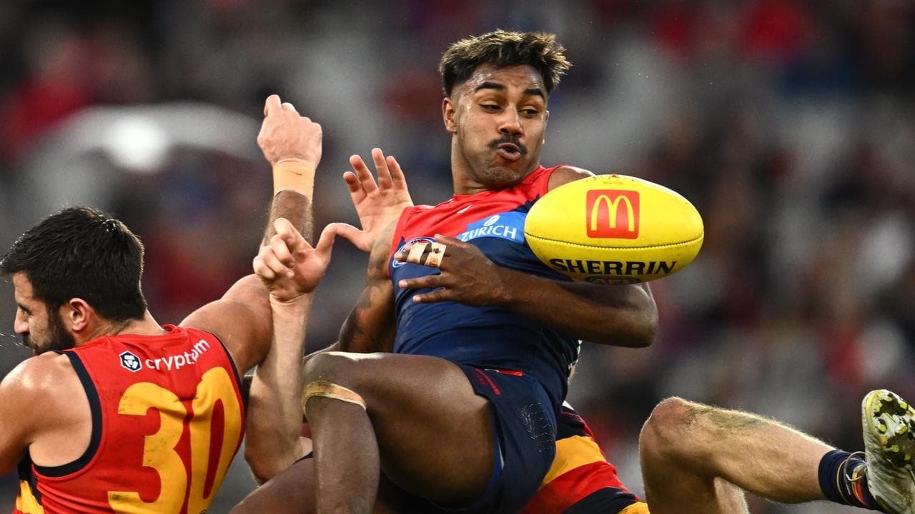 Demons hang tough to resist Crows' fightbacks