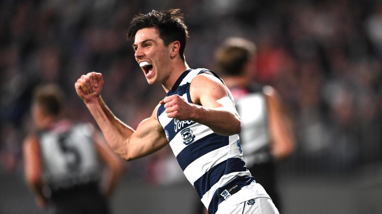 Cats' AFL flag defence alive after tight win over Power