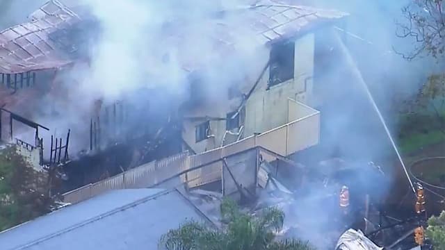 Queensland fire: bodies of five children, father found