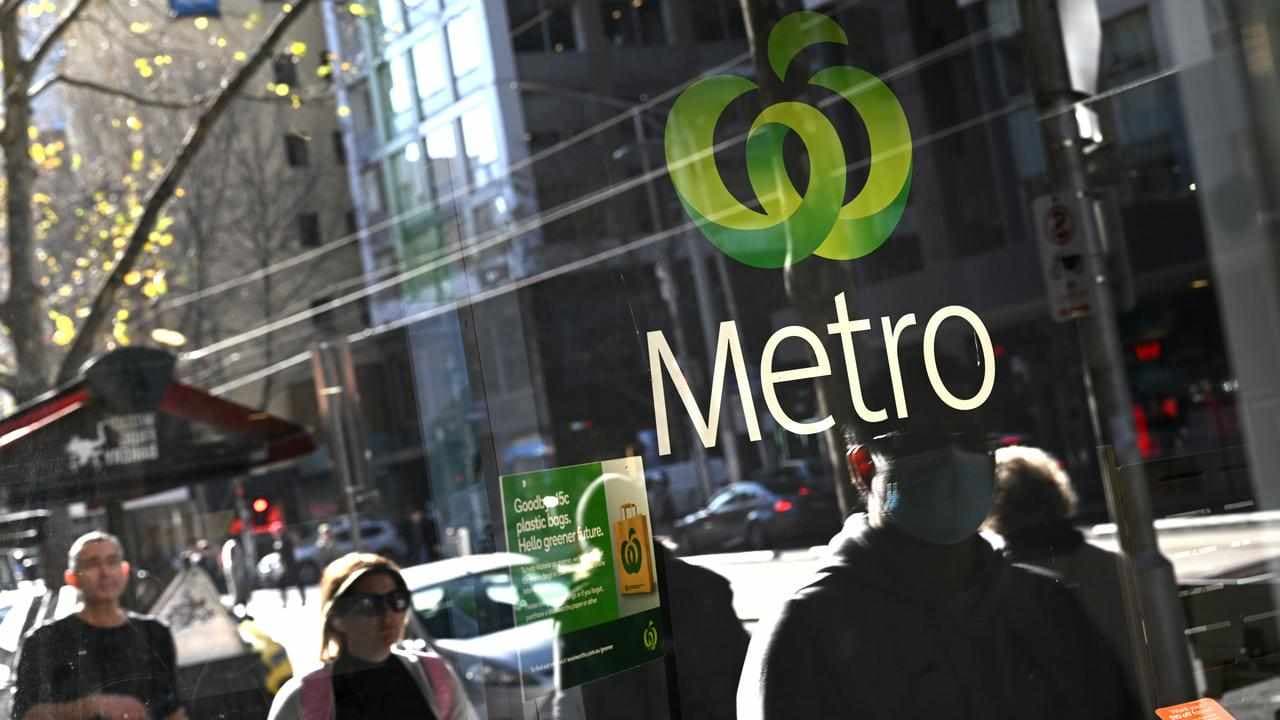 Woolworths says cautious customers are cutting back