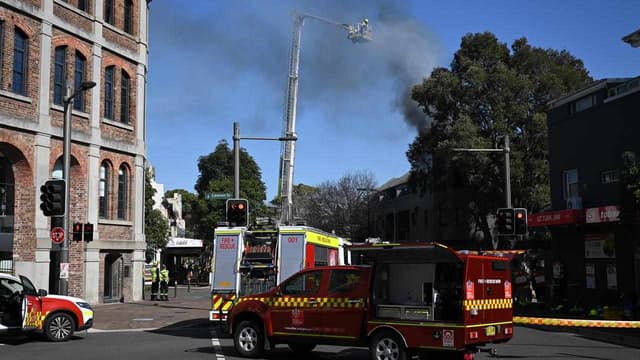 Man's body found after blaze rips through apartment