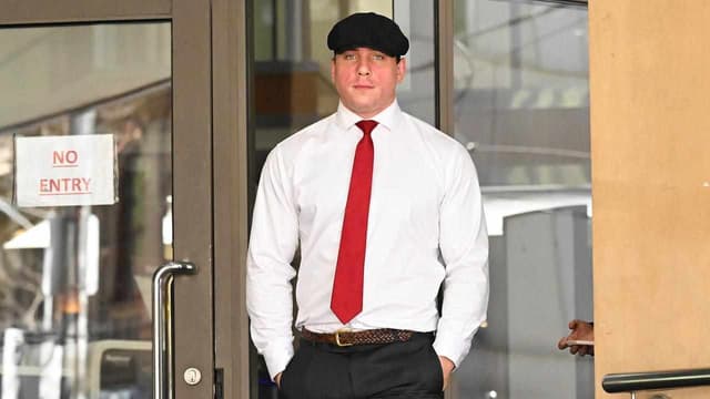 Far-right activist performs Nazi salute outside court