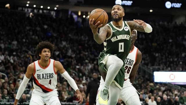 Bucks' Lillard fires in NBA comeback over former team